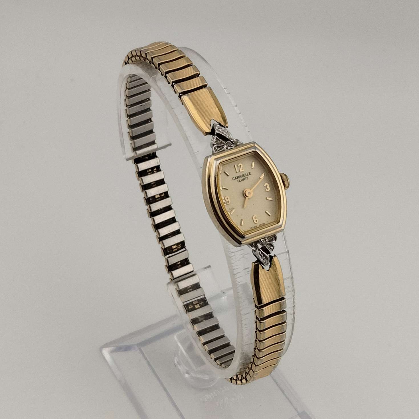 I Like Mikes Mid Century Modern Watches Caravelle by Bulova Quartz Petite Gold Tone Watch, Oval Dial, Stretch Strap