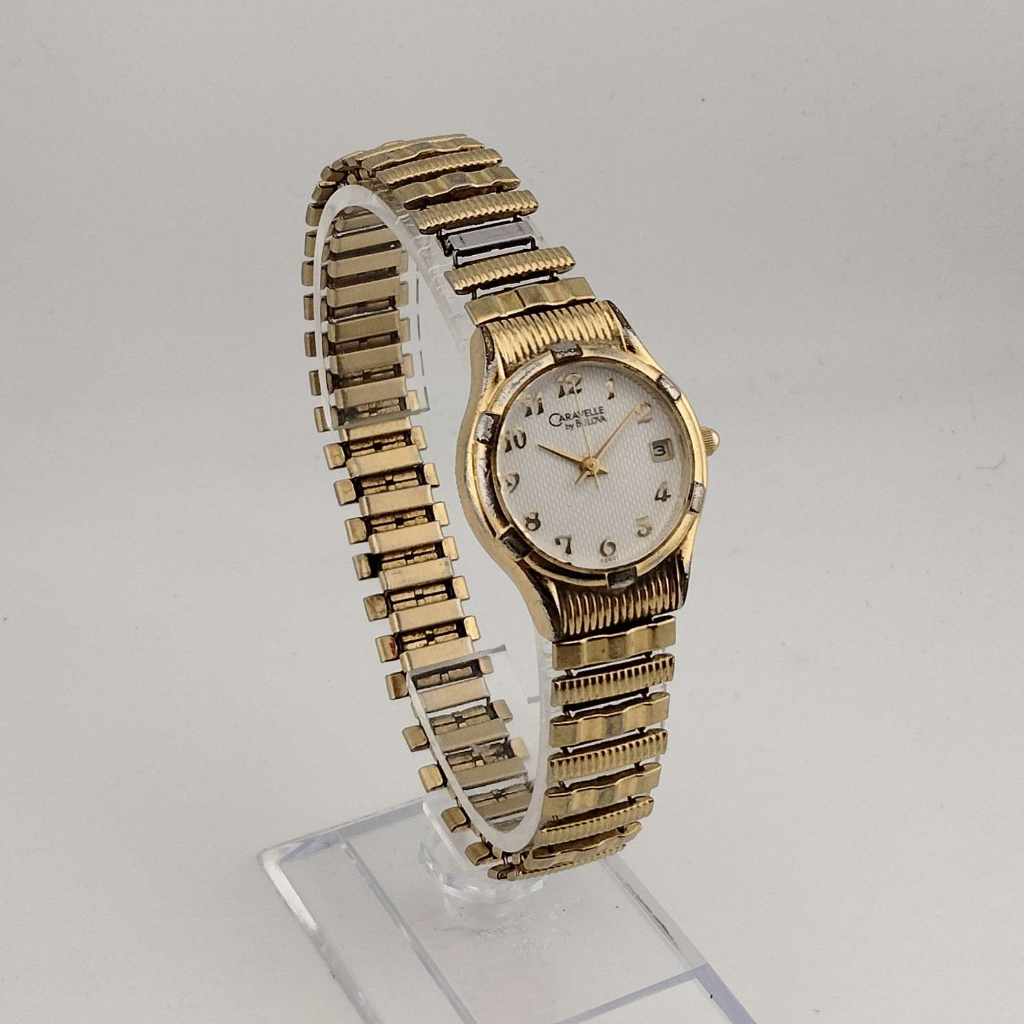 Caravelle by Bulova Unisex Gold Tone Quartz Watch, White 