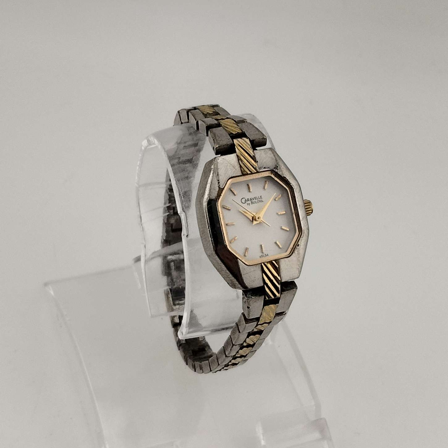 I Like Mikes Mid Century Modern Watches Caravelle by Bulova Unisex Mixed Metal Watch, White Octagonal Dial, Bracelet Strap