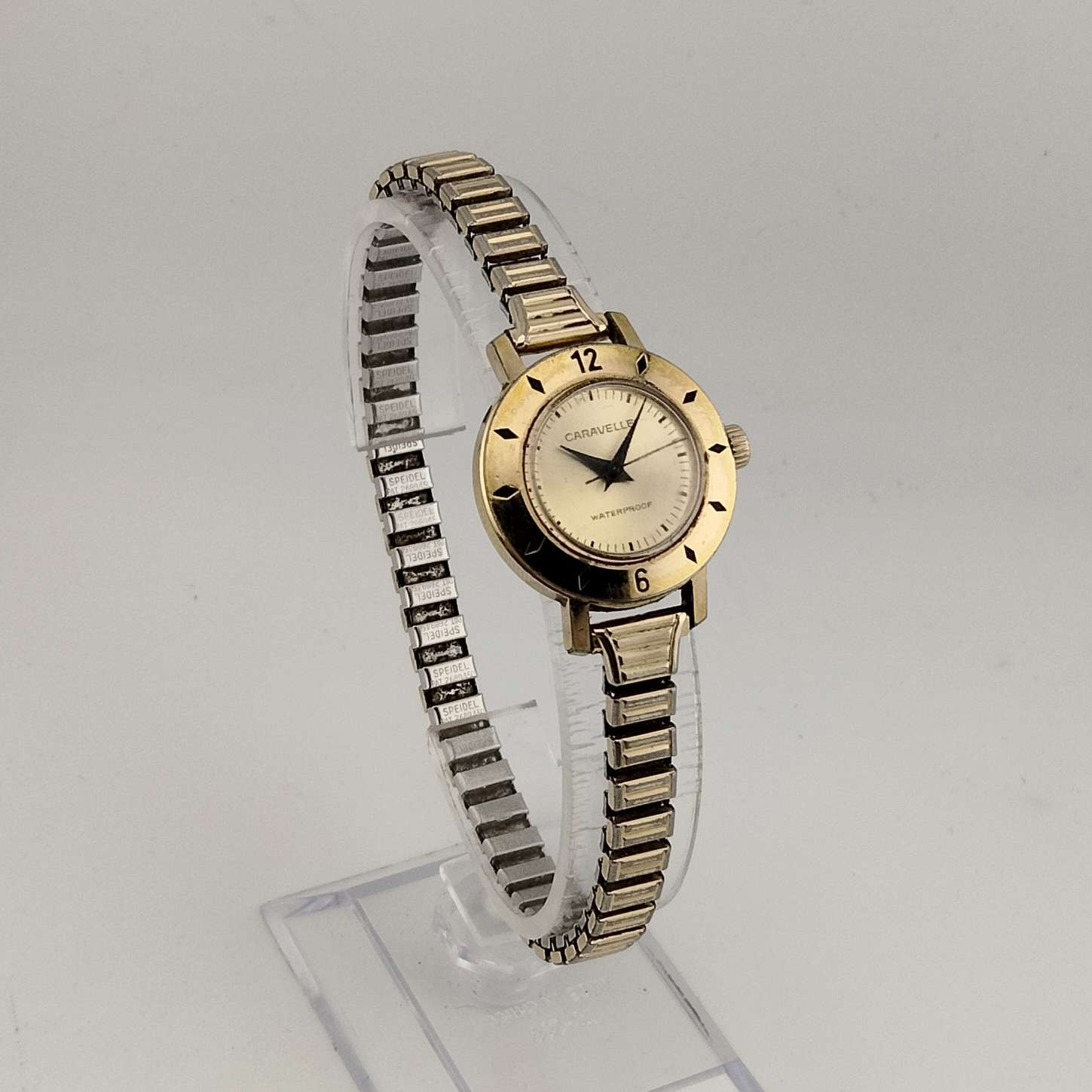 I Like Mikes Mid Century Modern Watches Caravelle by Bulova Women's Gold Tone Automatic Watch, Bezel Detail, Round Dial, Stretch Strap