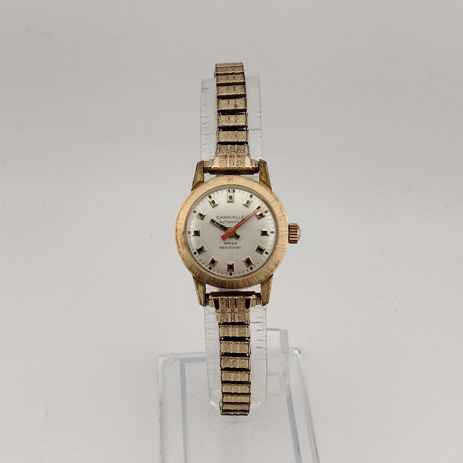 I Like Mikes Mid Century Modern Watches Caravelle by Bulova Women's Gold Tone Automatic Watch, Round Dial, Thin Stretch Strap