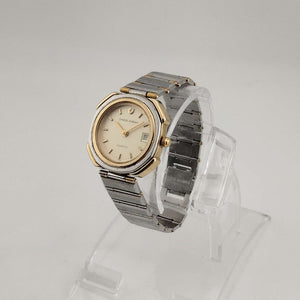 I Like Mikes Mid Century Modern Watches Charles Jourdan Women's Quartz Mixed Metal Tone Quartz Watch, Round Face, Date Window, Bracelet Strap