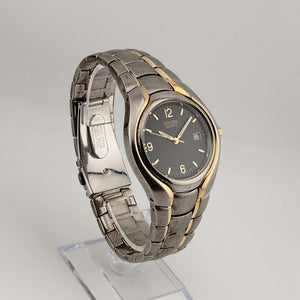 I Like Mikes Mid Century Modern Watches Citizen Men's Large Silver Tone Quartz Watch, Gold Tone Accents, Circular Black Dial, Date Window, Bracelet Strap