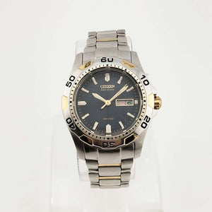 I Like Mikes Mid Century Modern Watches Citizen Men's Silver Tone Eco-Drive Watch, Gold Tone Details, Dark Blue Dial, Date and Day, Bracelet Strap