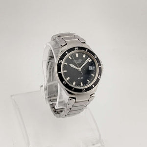 I Like Mikes Mid Century Modern Watches Citizen Men's Silver Tone Quartz Watch, Circular Black Dial, Date Window, Bezel Detail, Bracelet Strap