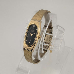 I Like Mikes Mid Century Modern Watches Citizen Petite Quartz, Gold Tone Watch, Elongated Black Oval Dial, Jewel Detail, Bracelet Strap
