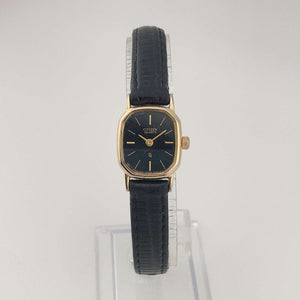I Like Mikes Mid Century Modern Watches Citizen Unisex Gold Tone Watch, Black Oval Dial, Leather Strap