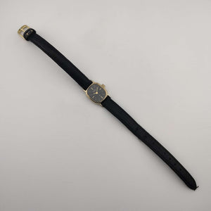 I Like Mikes Mid Century Modern Watches Citizen Unisex Gold Tone Watch, Black Oval Dial, Leather Strap