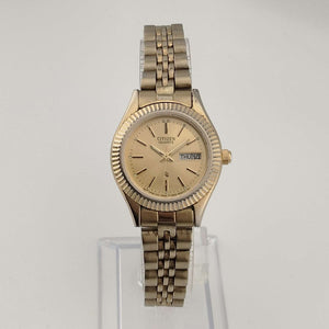 I Like Mikes Mid Century Modern Watches Citizen Unisex Gold Tone Watch, Round Dial, Date and Day Window, Bracelet Strap