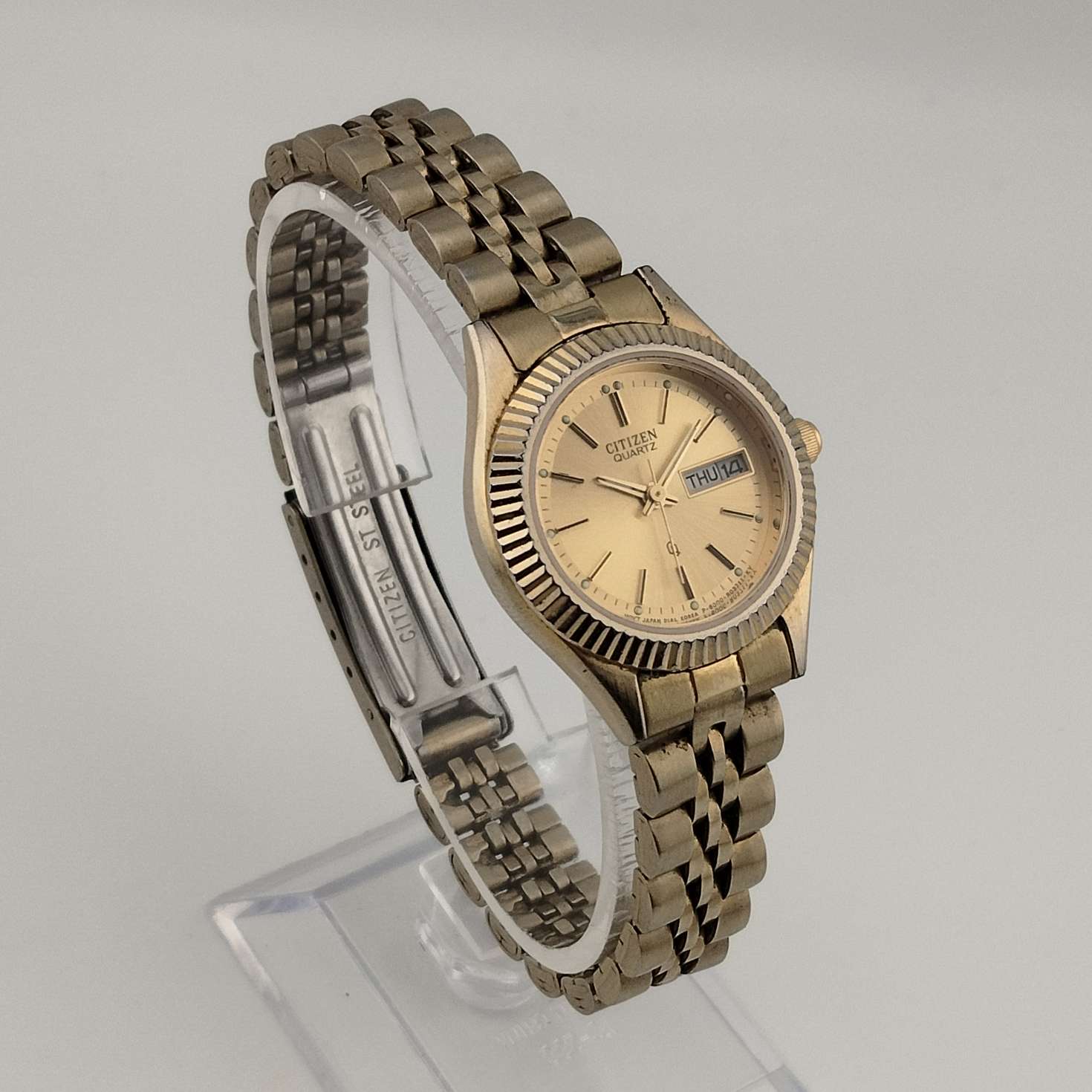 Citizen Unisex Gold Tone Watch, Round Dial, Date and Day 