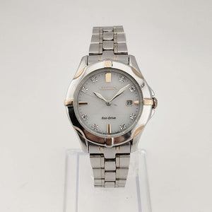 I Like Mikes Mid Century Modern Watches Citizen Unisex Silver Tone Eco-Drive Watch, Gold Tone and Jewel Details, Date Window, Bracelet Strap