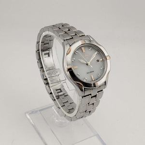I Like Mikes Mid Century Modern Watches Citizen Unisex Silver Tone Eco-Drive Watch, Gold Tone and Jewel Details, Date Window, Bracelet Strap