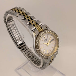 I Like Mikes Mid Century Modern Watches Citizen Women's Mixed Metal Round Watch,  Silver Tone Face, Mother of Pearl Dial with Gold Tone Accents, Bejeweled Bezel,  Mixed Metal Link Strap