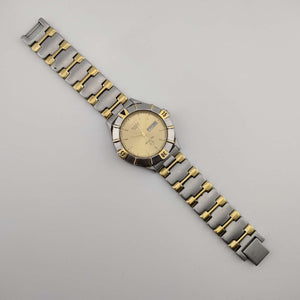I Like Mikes Mid Century Modern Watches Large Bulova Silver and Gold Tone Watch, Circular Dial, Day and Date Window, Bracelet Strap