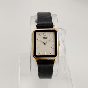 I Like Mikes Mid Century Modern Watches Petite Bulova Watch, White Rectangular Dial, Gold Tone Accents, Black Genuine Leather Strap