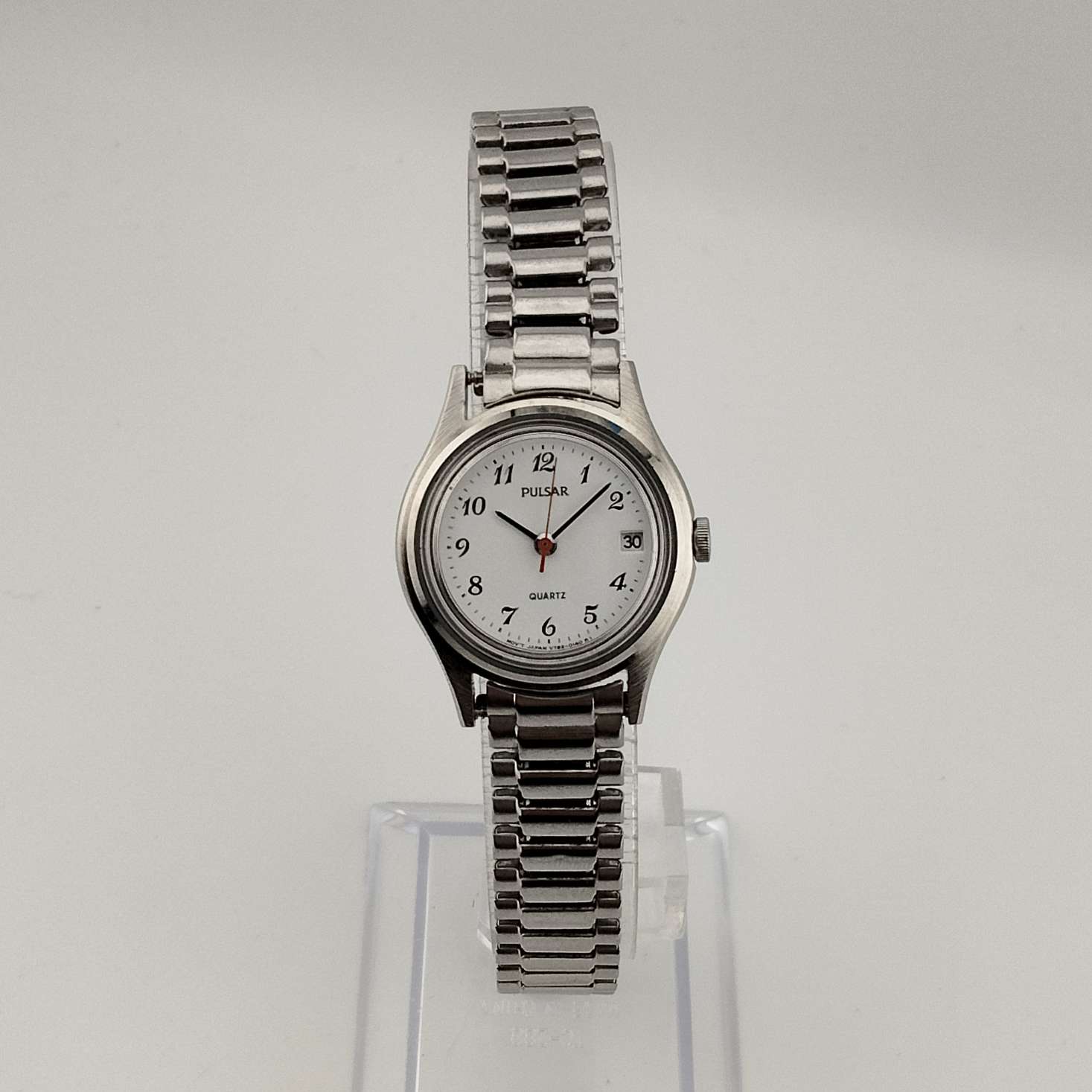 I Like Mikes Mid Century Modern Watches Pulsar Unisex Silver Tone Quartz Watch, Date Window, Stretch Strap