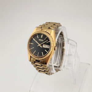 I Like Mikes Mid Century Modern Watches Seiko Men's Gold Tone Quartz Watch, Black Circular Dial, Date and Day Window, Bracelet Strap