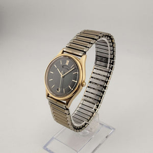 I Like Mikes Mid Century Modern Watches Seiko Men's Gold Tone Quartz Watch, Circular Black Dial, Date and Day Windows, Stretch Strap