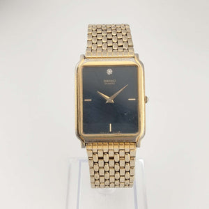 I Like Mikes Mid Century Modern Watches Seiko Men's Gold Tone Watch, Rectangular Black Dial, Jewel Detail, Bracelet Strap
