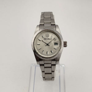 I Like Mikes Mid Century Modern Watches Seiko Men's Silver Tone Watch, Circular Dial, Date Window with Magnifying Detail, Bracelet Strap