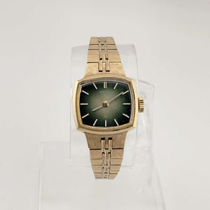 I Like Mikes Mid Century Modern Watches Seiko Petite Gold Tone Watch, Emerald Tone Rectangle Dial, Bracelet Strap