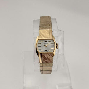 I Like Mikes Mid Century Modern Watches Seiko Petite Gold Tone Watch, Wind Up, Silver Tone Oval Dial, Bracelet Strap