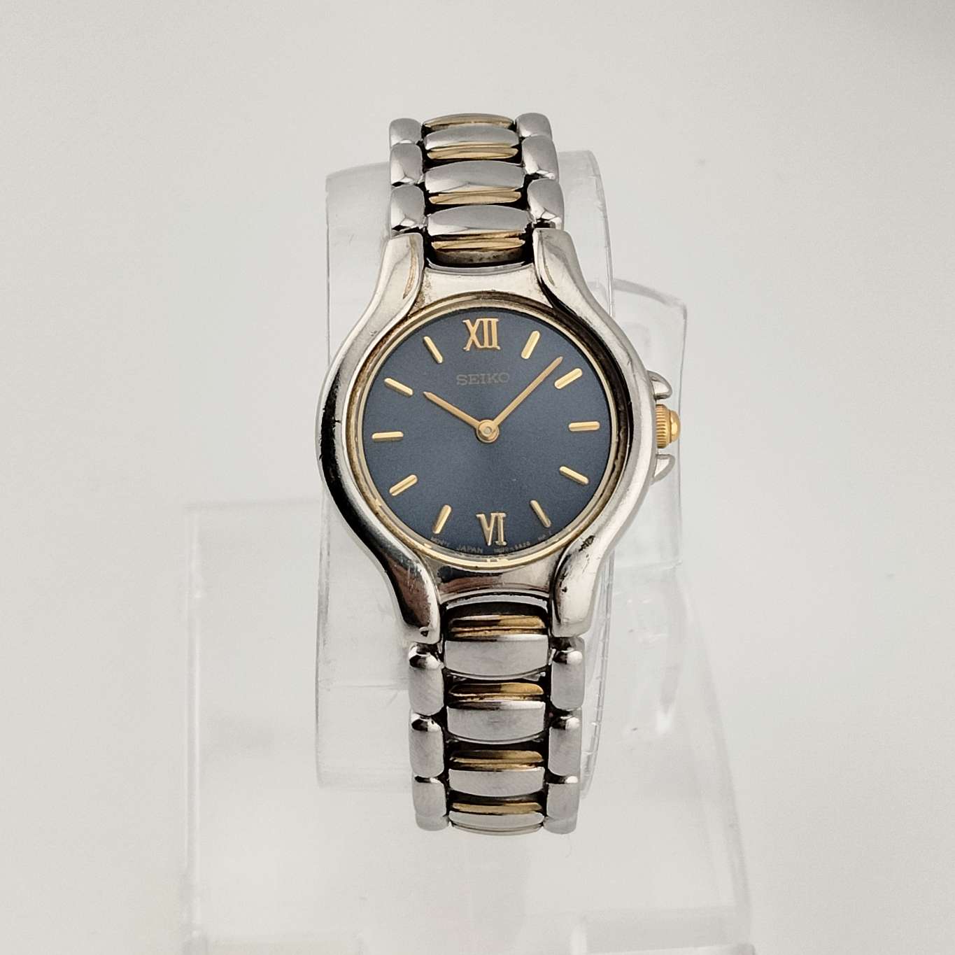 I Like Mikes Mid Century Modern Watches Seiko Petite Silver Tone Watch, Gold Tone Accents, Circular Blue Dial, Bracelet Strap