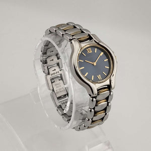 I Like Mikes Mid Century Modern Watches Seiko Petite Silver Tone Watch, Gold Tone Accents, Circular Blue Dial, Bracelet Strap