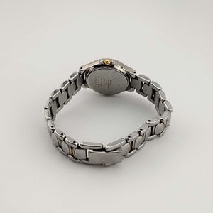 I Like Mikes Mid Century Modern Watches Seiko Petite Silver Tone Watch, Gold Tone Accents, Circular Blue Dial, Bracelet Strap