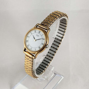 I Like Mikes Mid Century Modern Watches Seiko Round Woman's Watch, Gold Tone, White Face, Stretch Strap