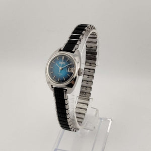 I Like Mikes Mid Century Modern Watches Seiko Silver Tone Automatic Watch, Circular Blue Dial, Date Window with Magnifying Detail, Stretch Strap