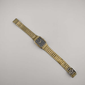 I Like Mikes Mid Century Modern Watches Seiko SX Quartz Gold Watch, Black Rectangular Dial, Adjustable Bracelet Strap