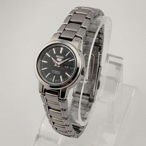 I Like Mikes Mid Century Modern Watches Seiko Unisex, Automatic, Date and Day, Silver Tone Watch, Black Dial, Bracelet Strap