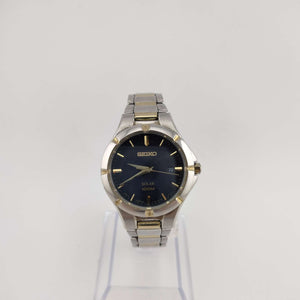 I Like Mikes Mid Century Modern Watches Seiko Unisex Mixed Metal Watch, Round Black Dial, Mixed Metal Bezel, Bracelet Strap