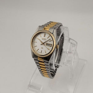 I Like Mikes Mid Century Modern Watches Seiko Unisex Silver Tone Watch, Gold Tone Details, Date and Day Window, Bracelet Strap
