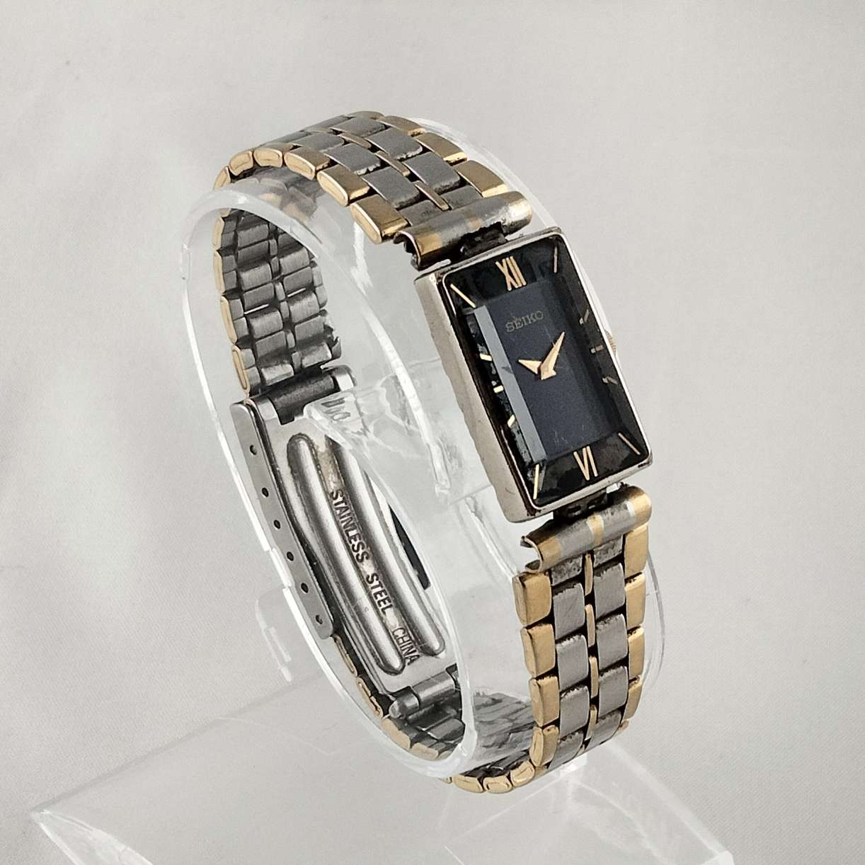 Seiko Unisex Watch, Navy Rectangular Dial, Beveled Crystal, Bracelet S ...