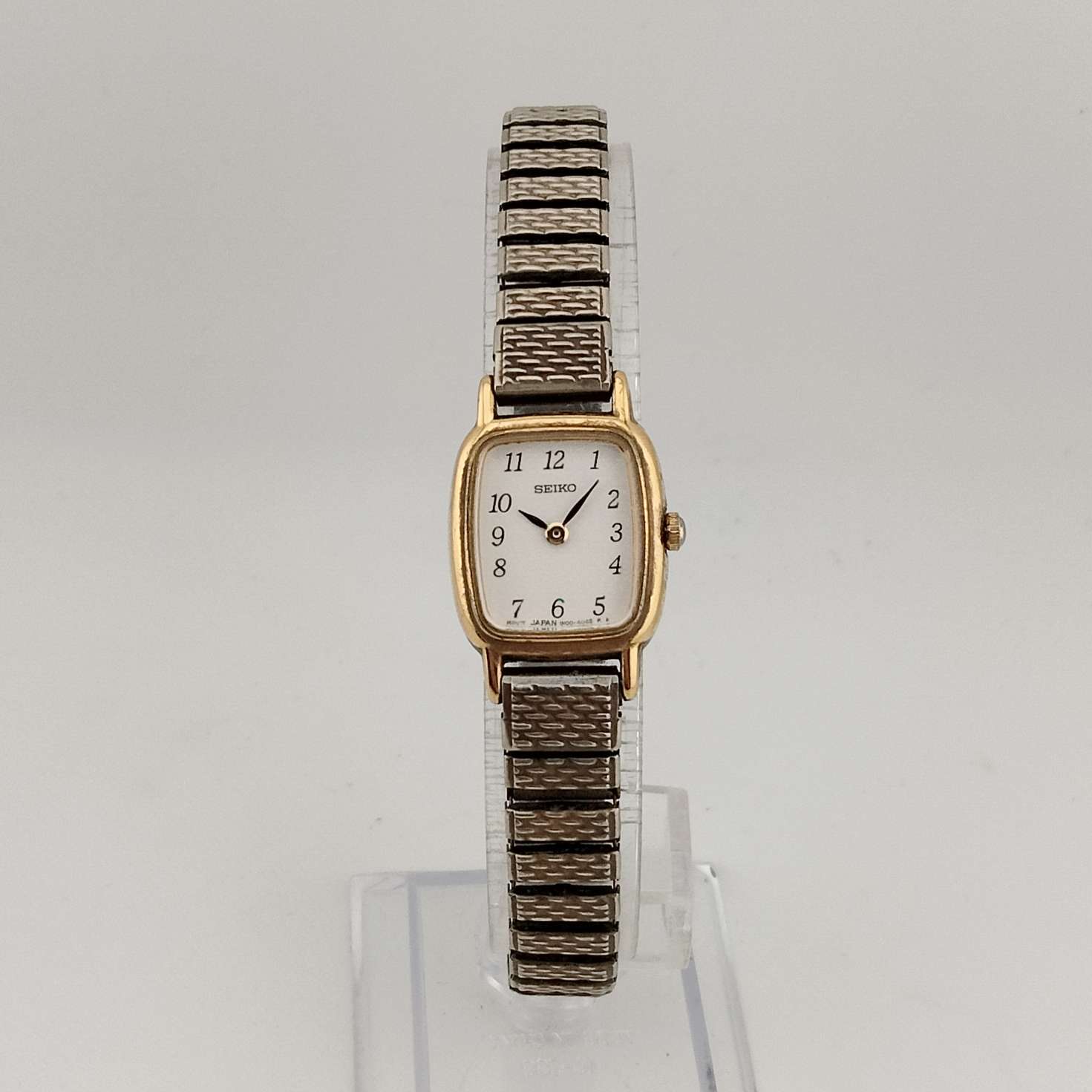 I Like Mikes Mid Century Modern Watches Seiko Women's Gold Tone Petite Watch, White Rounded Corner Rectangular Dial, Stretch Strap