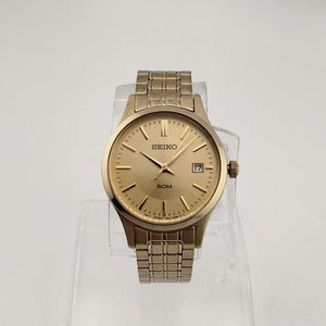 I Like Mikes Mid Century Modern Watches Seiko Women's Gold Tone Watch, Circular Dial, Date Window, Bracelet Strap