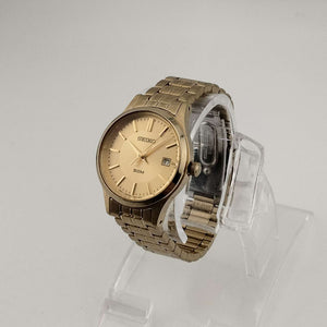 I Like Mikes Mid Century Modern Watches Seiko Women's Gold Tone Watch, Circular Dial, Date Window, Bracelet Strap
