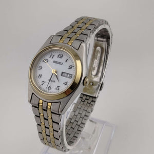 I Like Mikes Mid Century Modern Watches Seiko Women's Mixed Metal Watch, White Circular Dial, Date and Day Window, Bracelet Strap