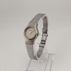 I Like Mikes Mid Century Modern Watches Seiko Women's Quartz Silver Tone Watch, Round Grey Face, Gold Jewel Details, Bracelet Strap