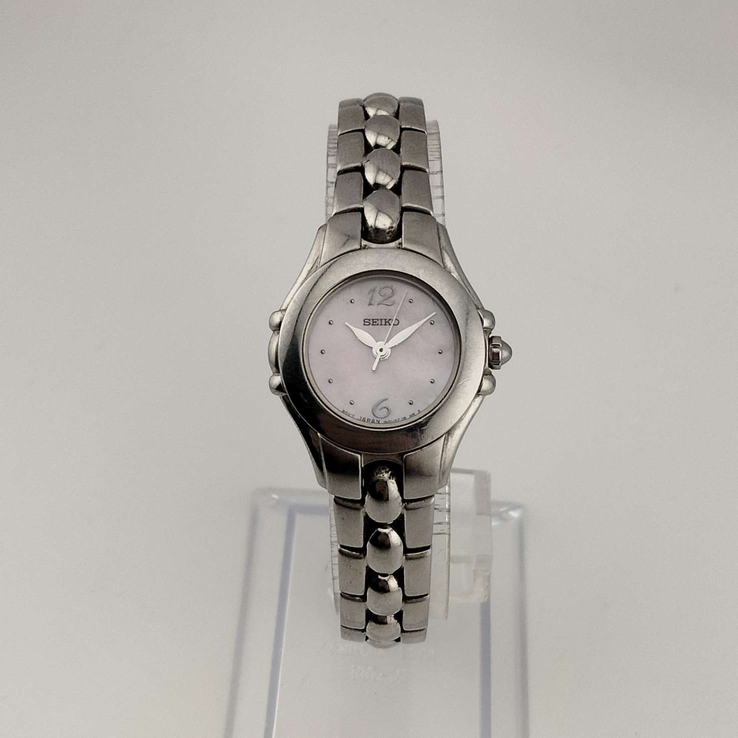 I Like Mikes Mid Century Modern Watches Seiko Women's Silver Tone Watch, Circular Pink Mother of Pearl Dial, Bracelet Strap