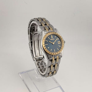 I Like Mikes Mid Century Modern Watches Seiko Women's Silver Tone Watch, Gold Tone Accents, Round Blue Dial, Date Window, Bracelet Strap (Copy)