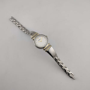 I Like Mikes Mid Century Modern Watches Seiko Women's Silver Tone Watch, Gold Tone Details, Round White Face, Jewel Bezel Details, Bracelet Strap