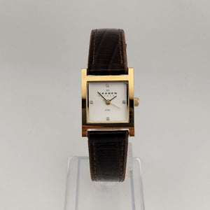 I Like Mikes Mid Century Modern Watches Skagen Unisex Gold Tone Watch, White Square Dial, Jewel Details, Genuine Brown Leather Strap