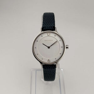 I Like Mikes Mid Century Modern Watches Skagen Unisex Silver Tone Watch, Round White Dial, Jewel Details, Genuine Blue Leather Strap