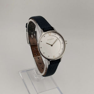 I Like Mikes Mid Century Modern Watches Skagen Unisex Silver Tone Watch, Round White Dial, Jewel Details, Genuine Blue Leather Strap