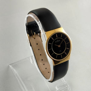 I Like Mikes Mid Century Modern Watches Skagen Unisex Stainless Steel Gold Tone Watch, Black Dial, Black Genuine Leather Strap