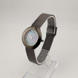 I Like Mikes Mid Century Modern Watches Skagen Unisex Watch, Silver Tone and Jewel Details, Circular Mother of Pearl Dial, Adjustable Mesh Strap