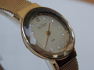 I Like Mikes Mid Century Modern Watches Skagen Women's Goldtone Round Gold Dial Jewel Number Markers Facet Cut Border Mesh Band